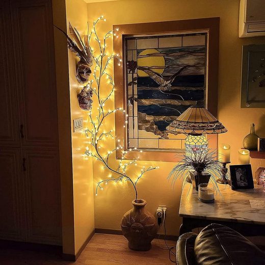 "2.3m LED grapevine fairy lights with remote, 144 LEDs, flexible modes, ideal for indoor/outdoor ambiance settings."