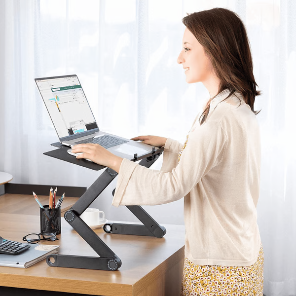 "360° adjustable ergonomic laptop stand with aluminum frame, full adjustability, ventilation, and lightweight for productivit