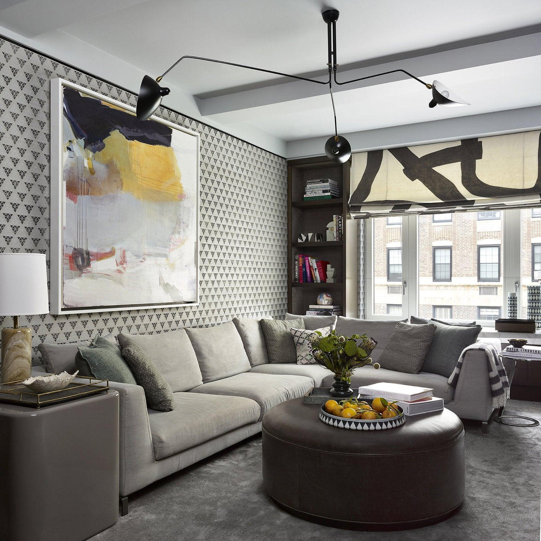 "Adjustable ceiling light with multiple arms, minimalist design, ideal for modern interiors, made of steel and aluminium."