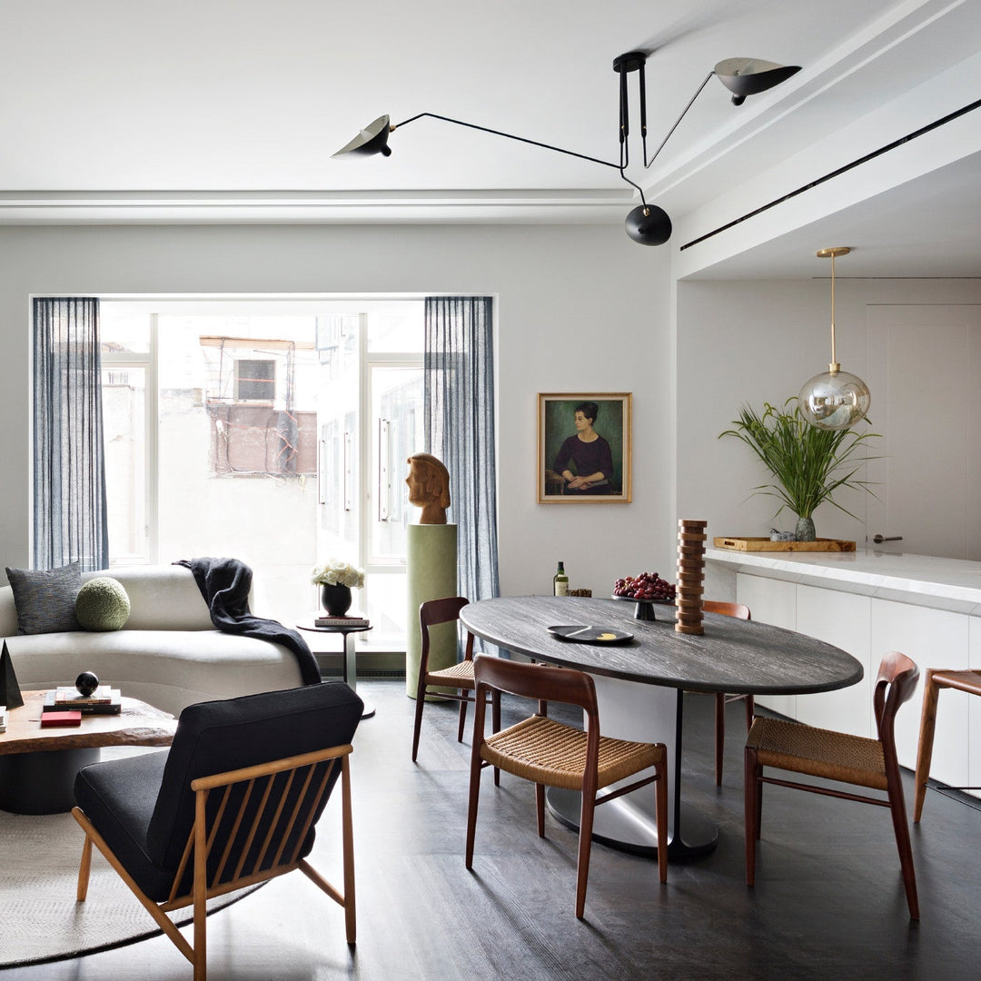 "Adjustable ceiling light with multiple arms, minimalist design, ideal for modern interiors, made of steel and aluminium."