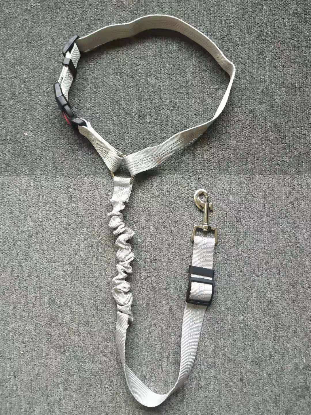 "Adjustable dog car seat belt providing safety, comfort, and tangle-free movement during car rides, easy to install."