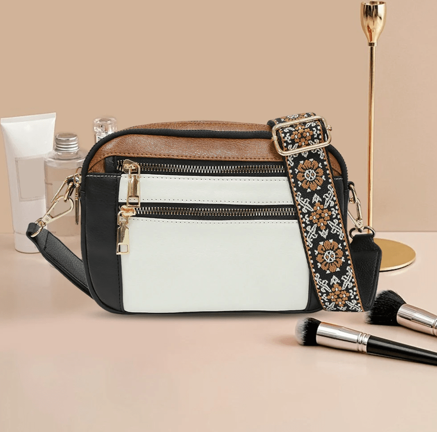 Durable adjustable shoulder strap for women's handbags. A functional and stylish bag accessory.