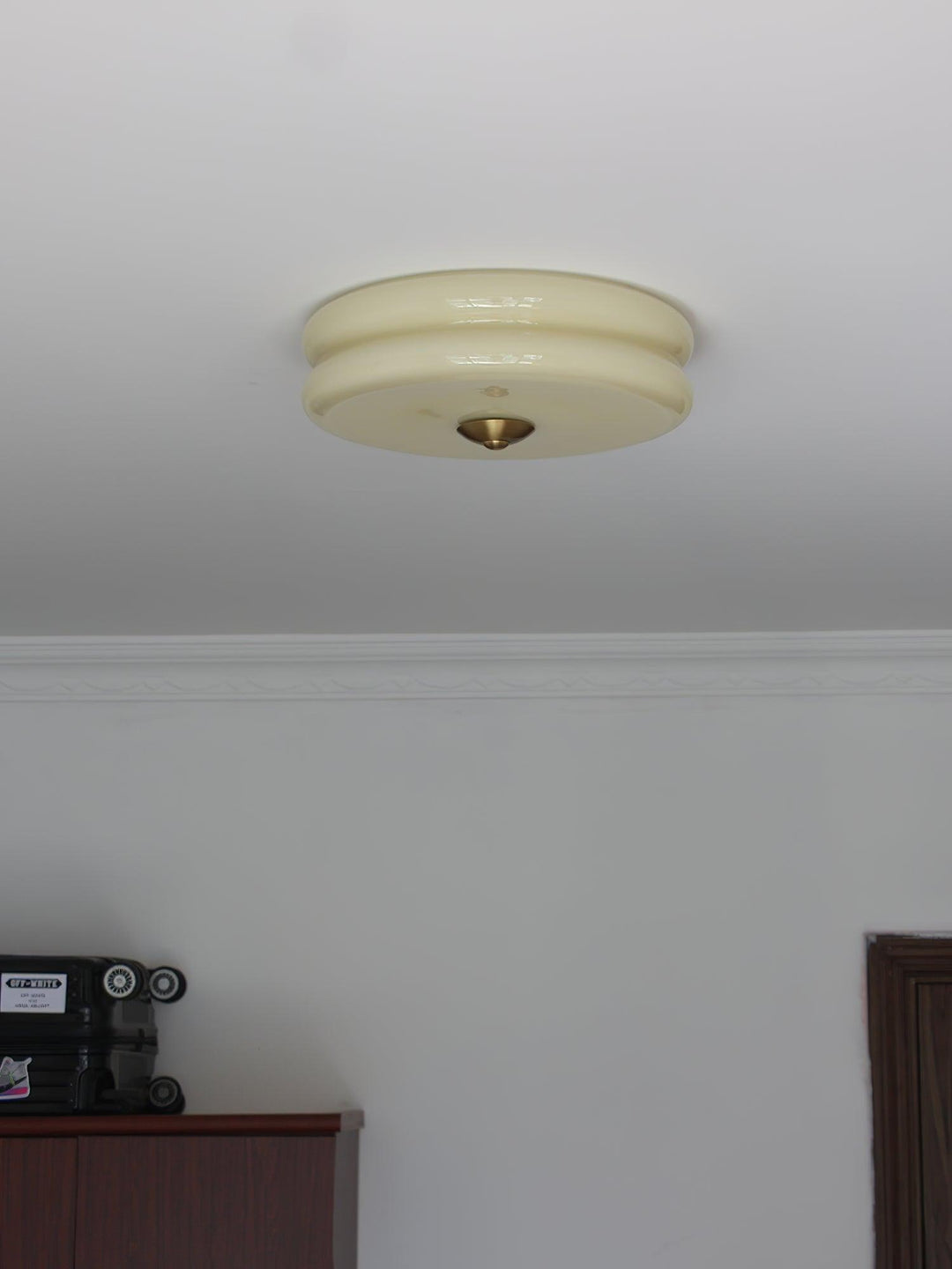 "Art Deco ceiling light with integrated LED, featuring geometric design in iron, metal, and glass for vintage elegance."