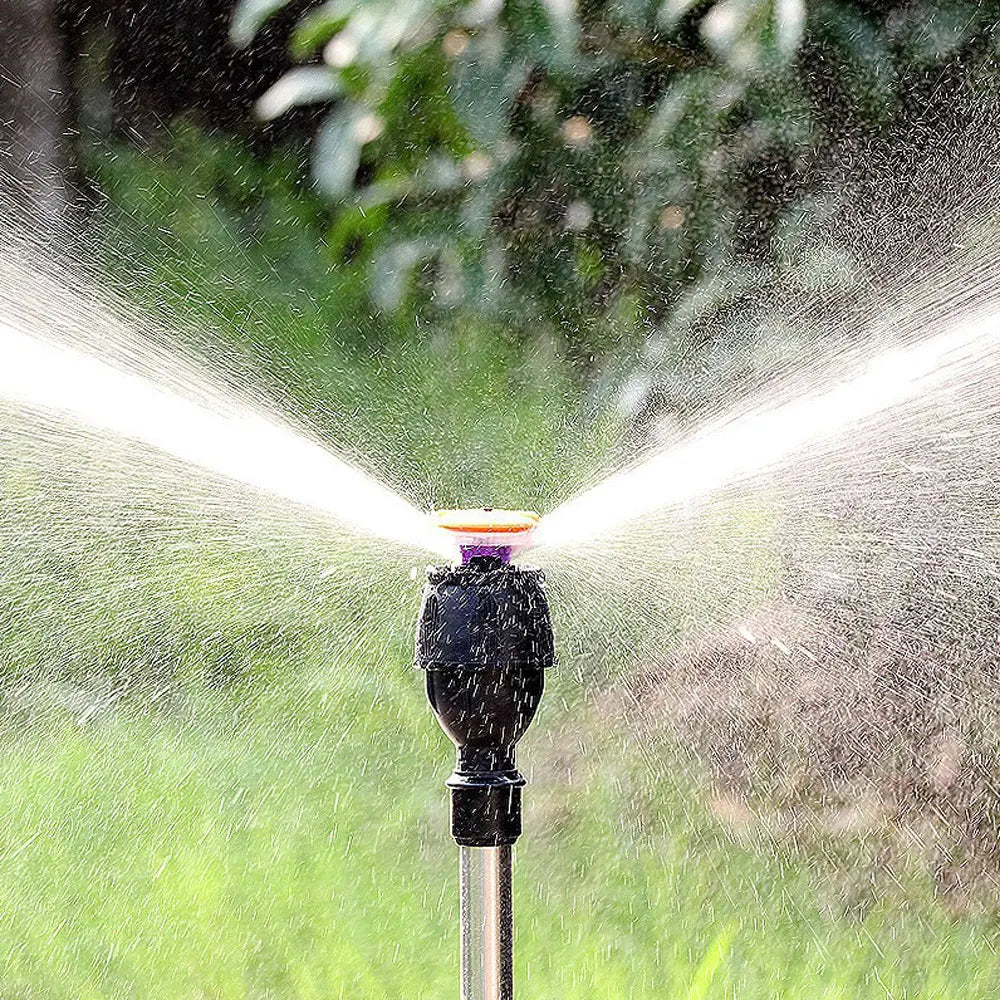 Automatic rotating garden sprinkler with adjustable tripod for customizable height, perfect for even water distribution.