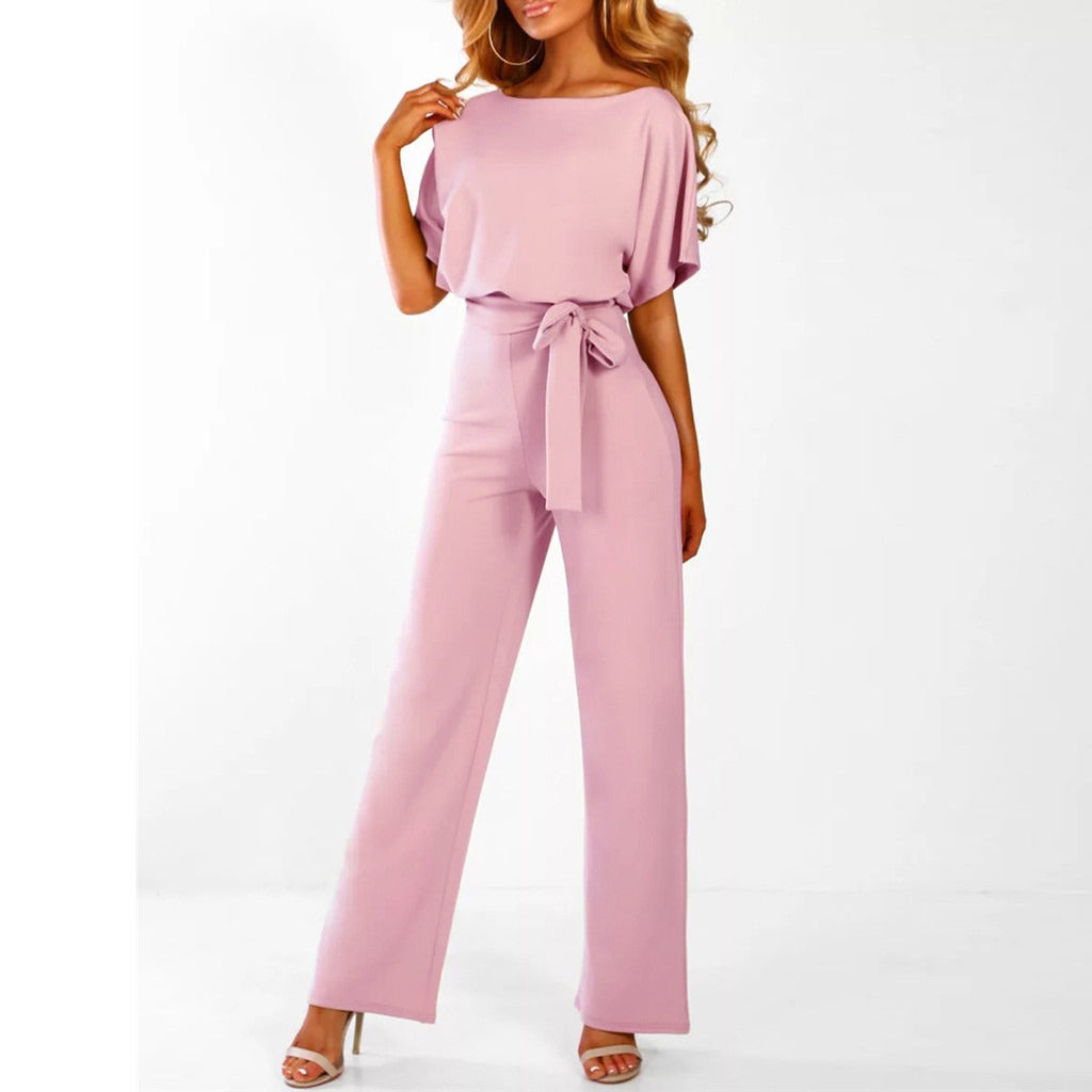 Beige women's elegant wide-leg jumpsuit with short sleeves and self-tie belt, perfect for stylish occasions.
