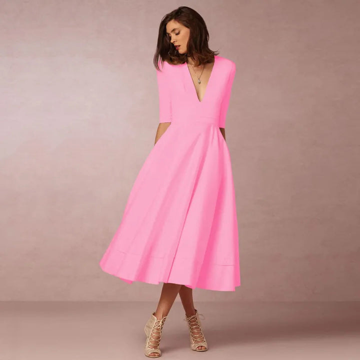 "Black A-Line V-Neck Short Sleeve Mini Dress for Spring/Summer, women's flattering silhouette, breezy and elegant style."