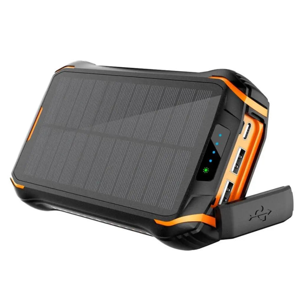 "Black and orange portable solar power bank for outdoor use, showcasing sleek design and multiple charging ports."