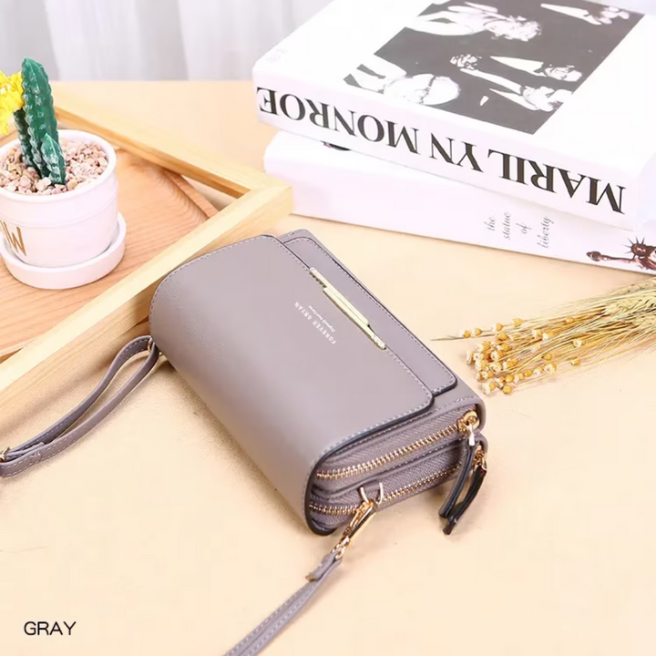 Elegant black leather women's fashion crossbody, a secure wallet and organizer in one.