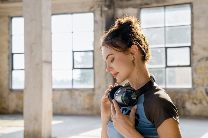Black wireless over-ear headphones with Bluetooth and hybrid active noise cancellation, featuring memory foam earcups and USB