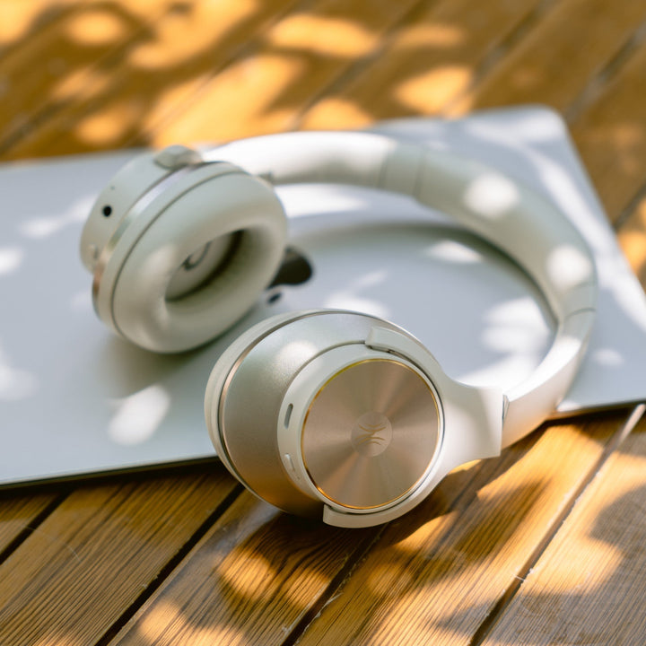 Black wireless over-ear headphones with Bluetooth and hybrid active noise cancellation, featuring memory foam earcups and USB