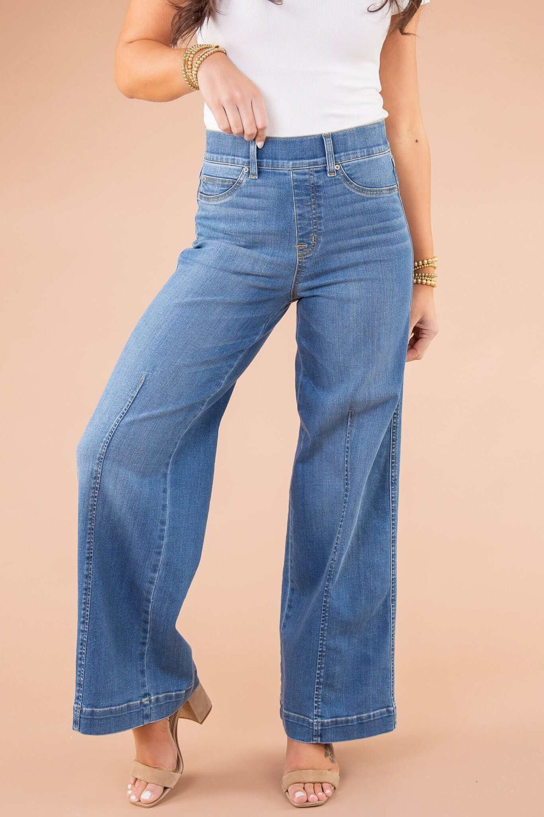 Blue high-waist wide-leg women's jeans, perfect for a comfortable & stylish casual look.