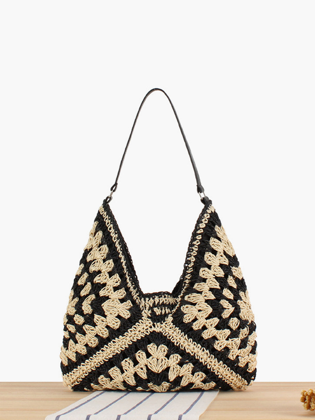 Boho crochet shoulder bag for women, artisan-crafted with unique geometric design. Perfect casual summer accessory.