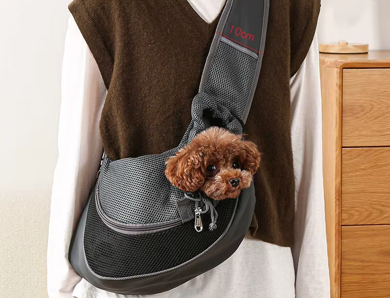"Breathable pet carrier shoulder bag, grey with padded strap, for small dogs and cats, perfect for travel and comfort."
