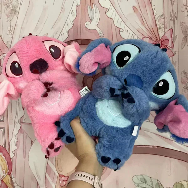 Calming plush toy with breathing simulation, soft and cuddly, anxiety relief; suitable for kids and adults, blue and pink.