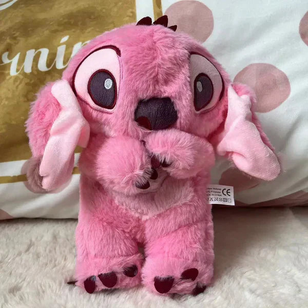 Calming plush toy with breathing simulation, soft and cuddly, anxiety relief; suitable for kids and adults, blue and pink.