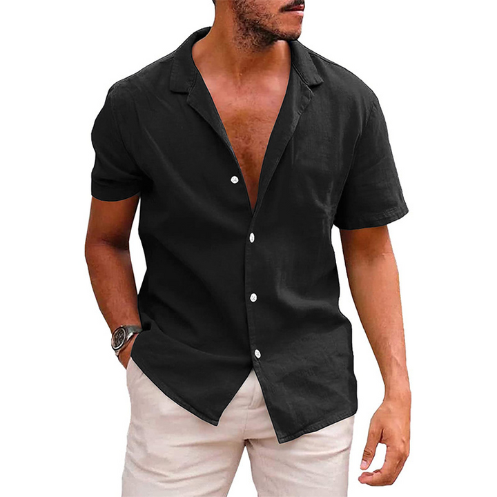"Casual men's short-sleeve button-down shirt with a relaxed fit and open collar in light blue, perfect for summer comfort."