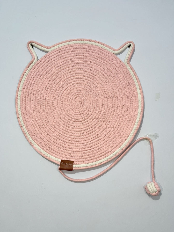 "Cat lounging on stylish, durable cat scratching rug; elegant, textured mat for optimal claw care and furniture protection."