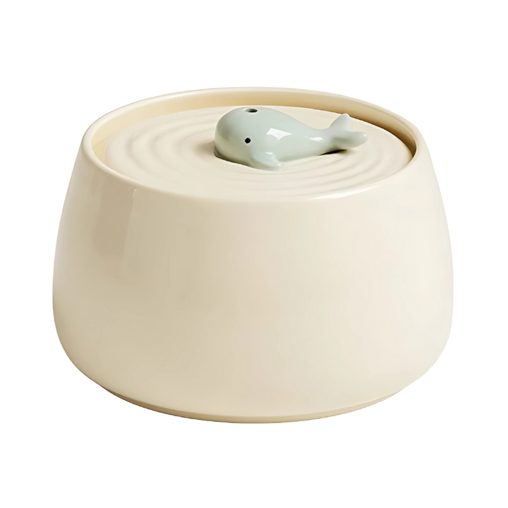 Ceramic pet bowl with quiet filtration; stylish design in beige or green, ensures fresh water and complements home decor.