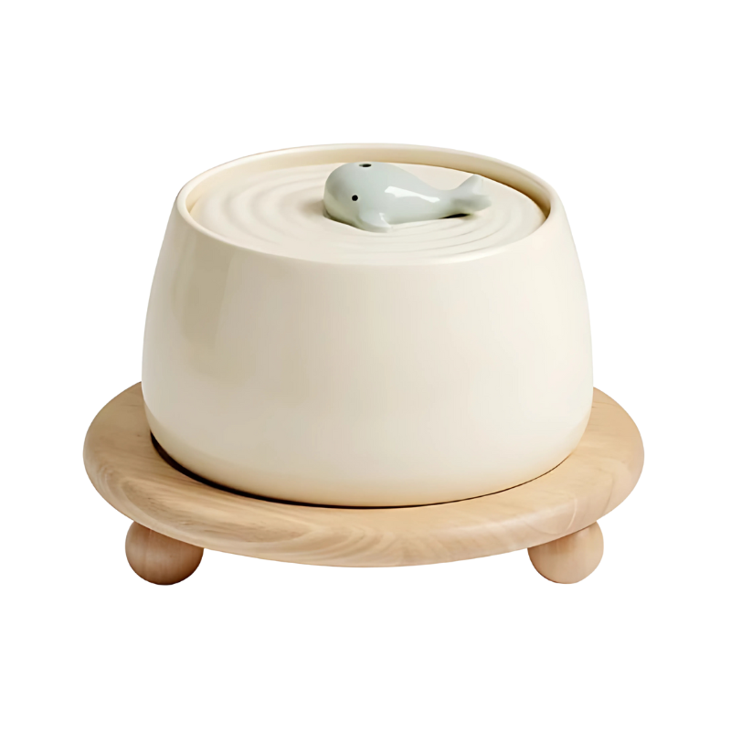 Ceramic pet bowl with quiet filtration; stylish design in beige or green, ensures fresh water and complements home decor.
