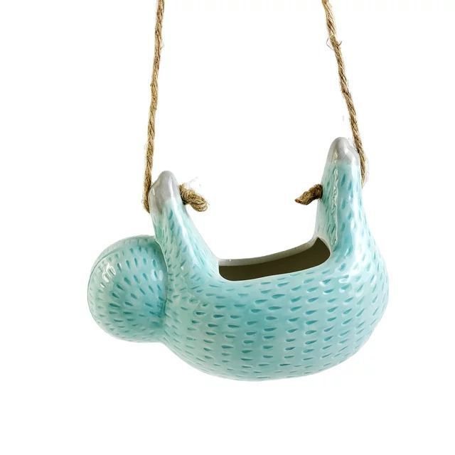 Ceramic sloth hanging flowerpot with hemp rope; whimsical design in blue, grey, or khaki, perfect for home decor.
