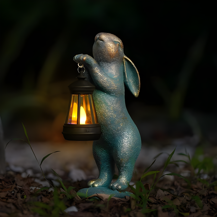 Cute rabbit statue for garden decor, featuring intricate details. Enhances patio, lawn, or outdoor areas with charming animal art.