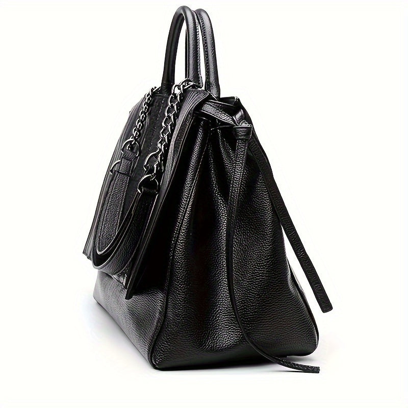 Chic black shoulder bag for women, sleek and spacious; ideal for office and casual use, complements all outfits.