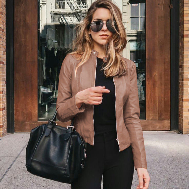 Sleek women's pink leather jacket, a fashionable & comfortable outerwear piece for modern everyday style.