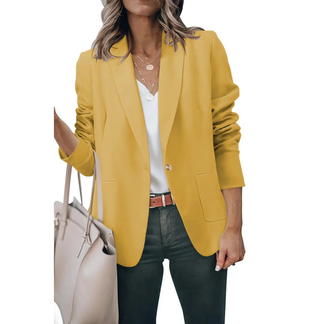 Fashionable women's puff sleeve blazer, a chic outerwear piece offering effortless style for any occasion.