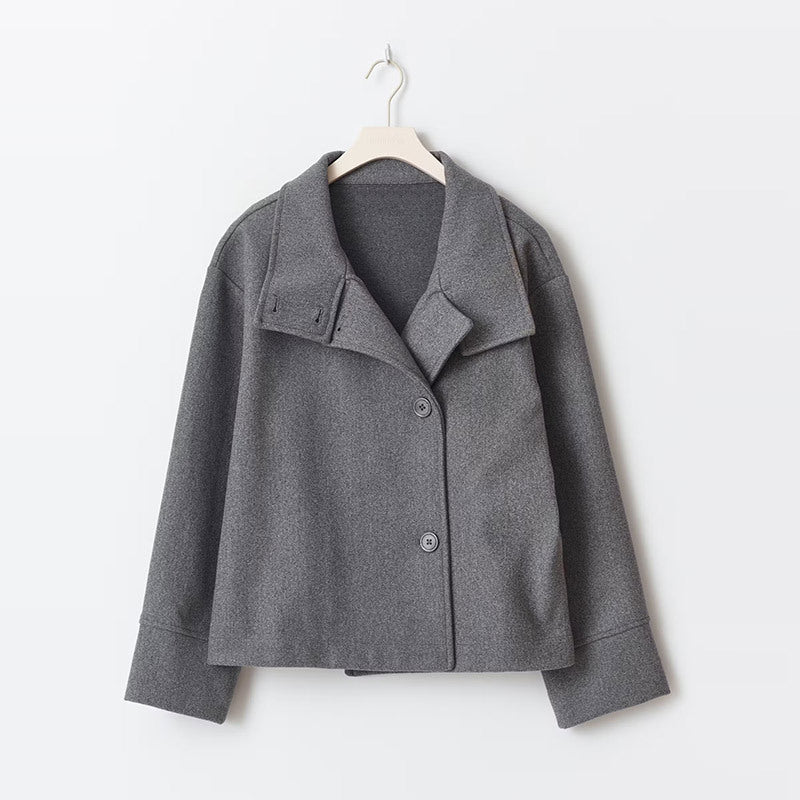 Elegant women's double-breasted short jacket, a modern and stylish outerwear piece for chic fall fashion.