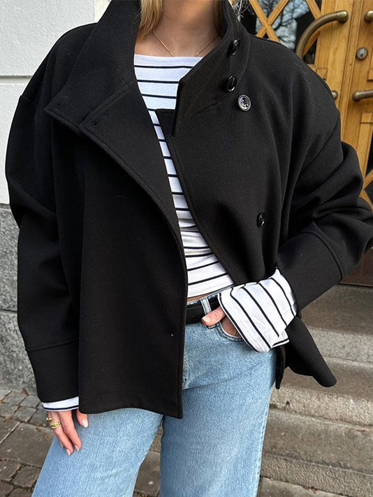 Stylish & versatile women's short double-breasted jacket. Chic outerwear for elegant fall and winter fashion.