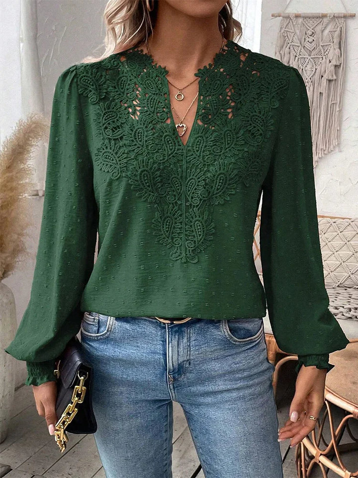 Stylish women's summer top, lightweight and flowy, suitable for both casual and office wear.