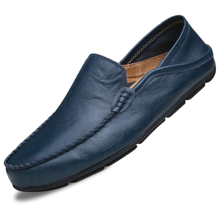 Versatile men's classic slip-on loafers in navy. Easy-wear design for comfort at work or as casual footwear.