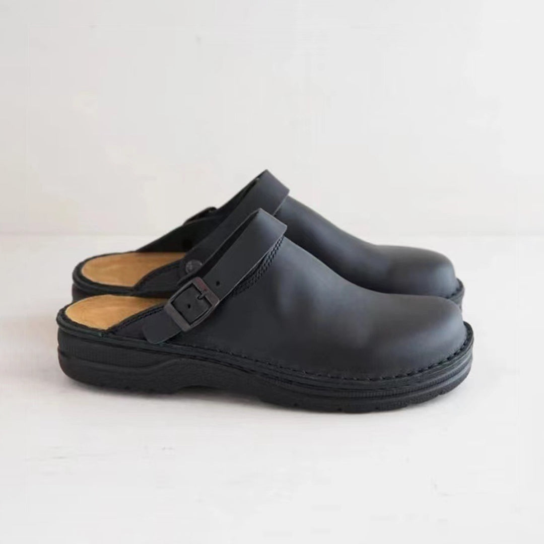 Stylish brown leather men's classic slip-on slippers, offering easy wear and ultimate comfort for home or casual use.