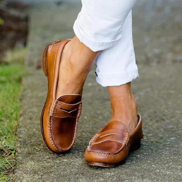 Classic women's slip-on loafers, perfect for work & everyday wear. Comfortable, professional, & chic flats.