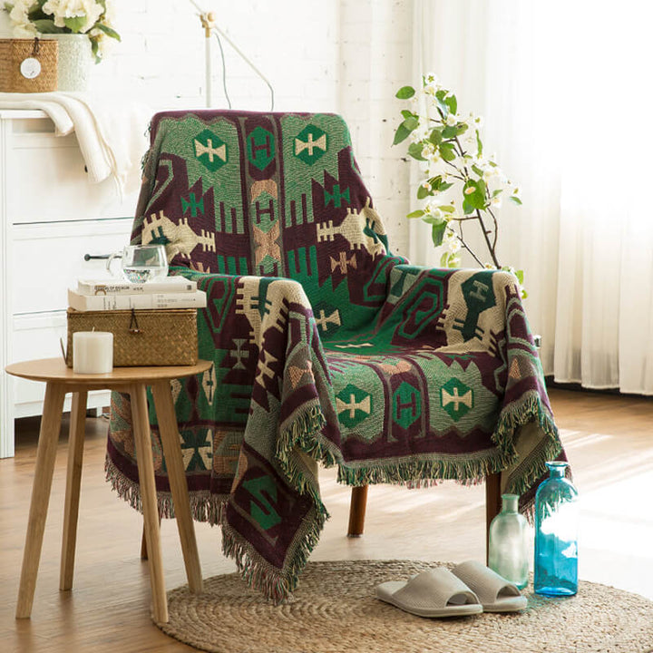 "Colorful bohemian tassel knitted sofa throw, featuring bright patterns and ethnic tassel details for vibrant home decor."