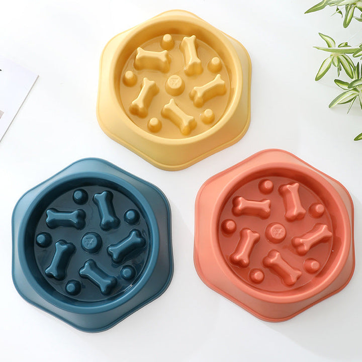 "Colorful slow eating feeding bowl for dogs with bone-shaped obstacles, promoting healthy digestion and reducing choking risk