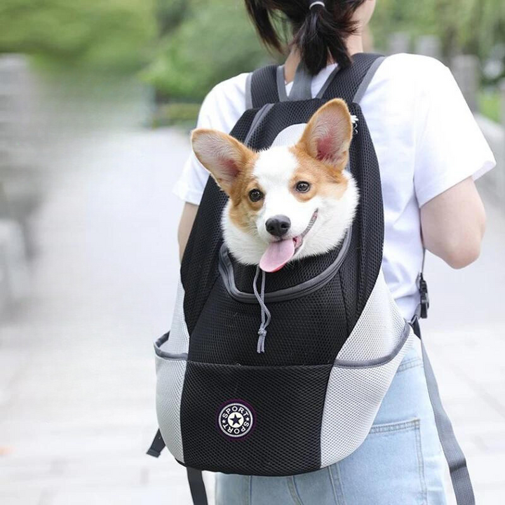 "Comfortable pet carrier backpack for outdoor adventures with adjustable straps, breathable fabric, side view in stylish colo