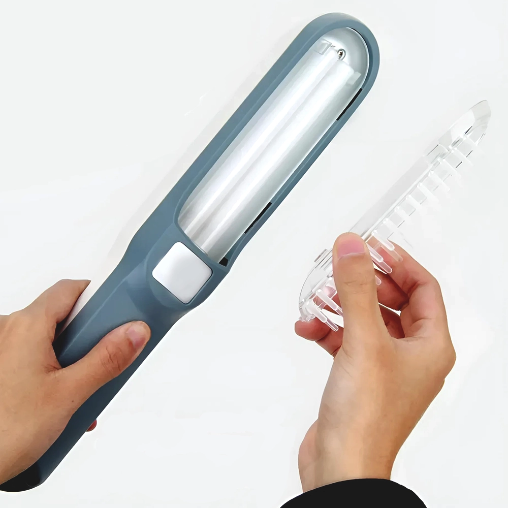 "Compact handheld UVB light therapy device for skin conditions, featuring a portable design and clear LCD display."