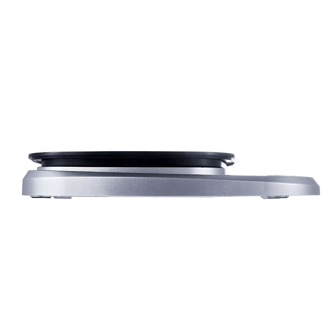 "Compact stainless steel kitchen scale with sleek design for precise 0.1g measurements, ideal for culinary accuracy."