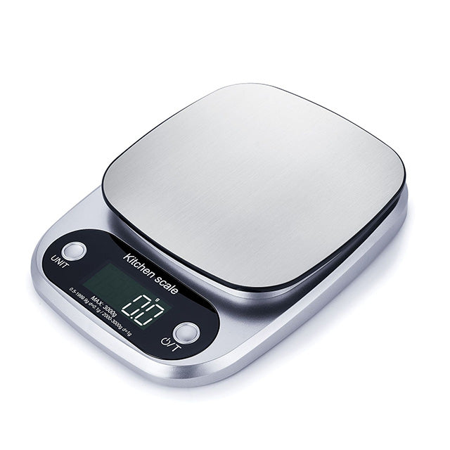 "Compact stainless steel kitchen scale with sleek design for precise 0.1g measurements, ideal for culinary accuracy."