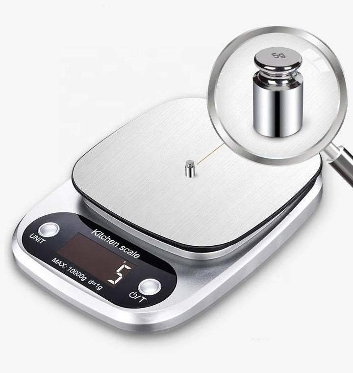 "Compact stainless steel kitchen scale with sleek design for precise 0.1g measurements, ideal for culinary accuracy."
