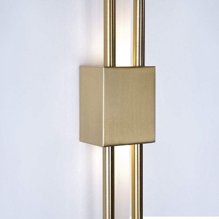 "Contemporary frosted glass wall lamp with dual lights, gold finish, featuring Italian-inspired design and soft illumination.