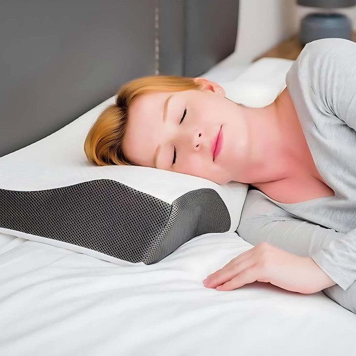 "Contoured memory foam neck pillow for pain relief, featuring spinal alignment support; ideal for better sleep."