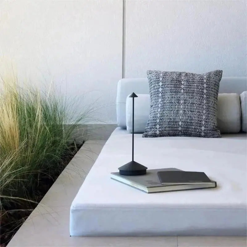 "Cordless rechargeable table lamp, sleek pine-like design, touch control, USB-powered, waterproof, dimmable LED lighting."