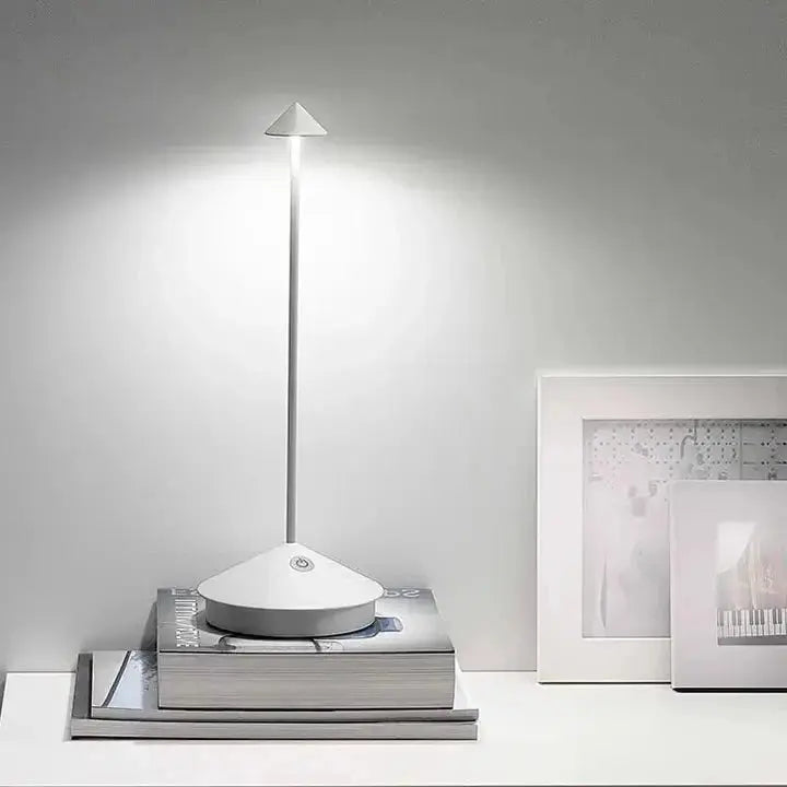 "Cordless rechargeable table lamp, sleek pine-like design, touch control, USB-powered, waterproof, dimmable LED lighting."