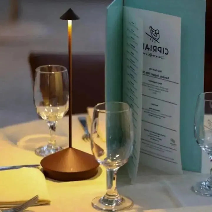 "Cordless rechargeable table lamp, sleek pine-like design, touch control, USB-powered, waterproof, dimmable LED lighting."