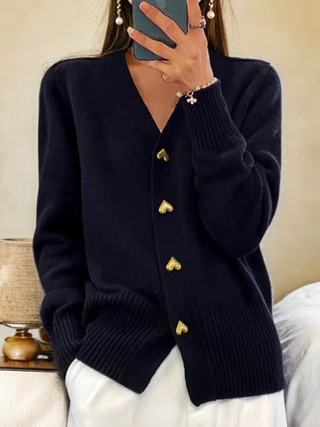 "Cozy knit women's cardigan with heart buttons; stylish and versatile with soft fabric, perfect for layering in cool weather.