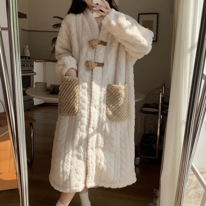 Warm hooded women's lounge robe with long sleeves, perfect as cozy winter sleepwear or a thoughtful gift for her.