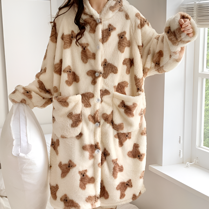 Ultra-soft women's hooded long sleeve winter bathrobe, designed for maximum warmth and cozy relaxation.