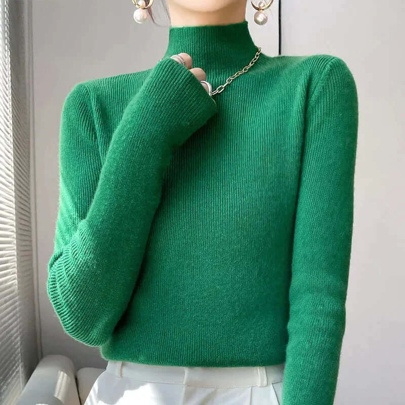 Cozy women's knitted half turtleneck sweater in cream, perfect for fall and winter fashion.
